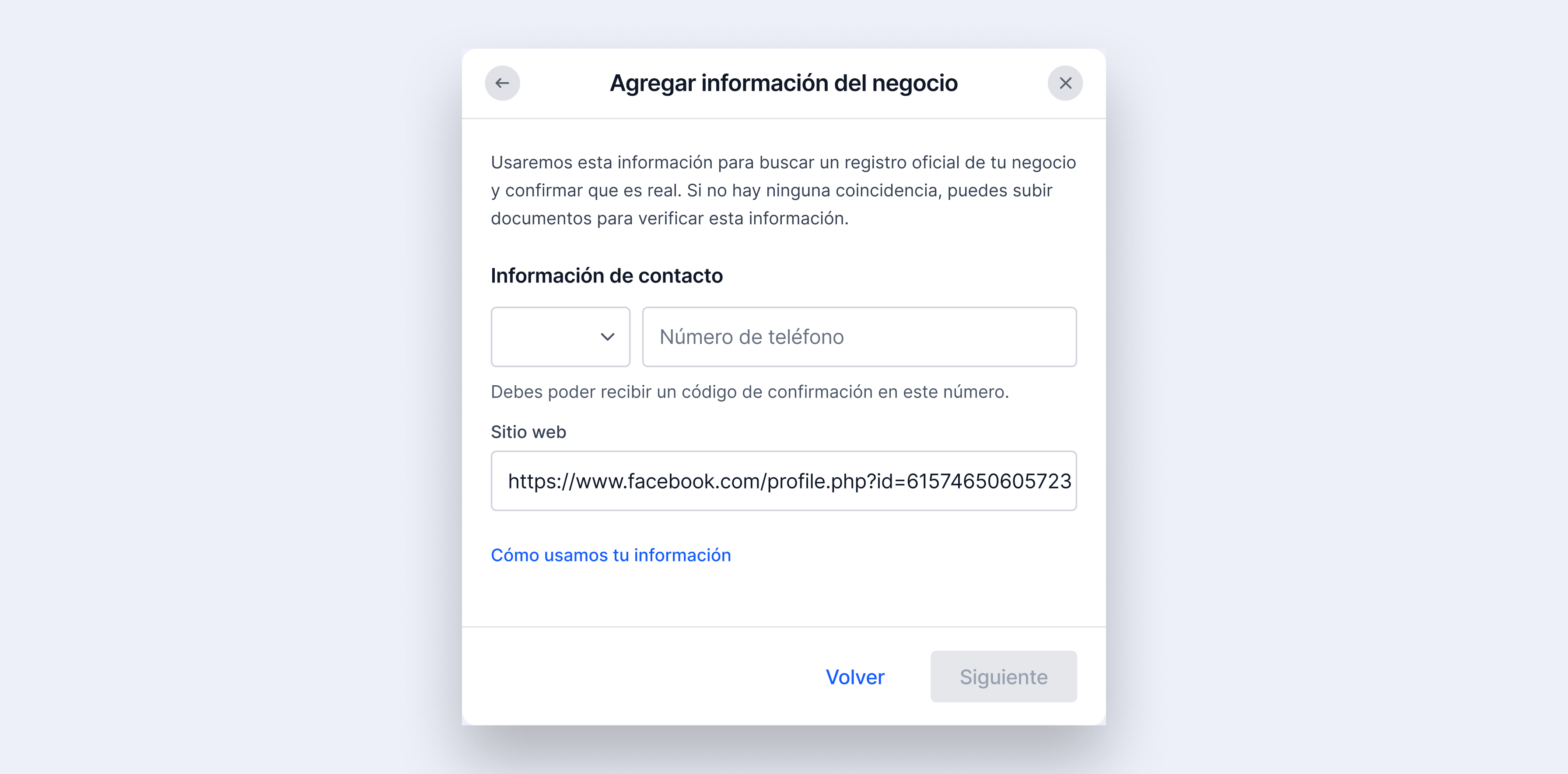 Pantalla de información de contacto para la verificación del negocio, con campos para número de teléfono y URL del sitio web de la empresa.