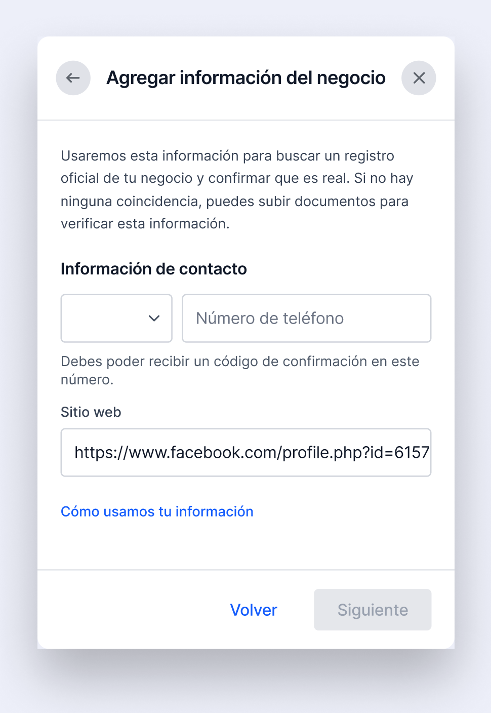 Pantalla de información de contacto para la verificación del negocio, con campos para número de teléfono y URL del sitio web de la empresa.